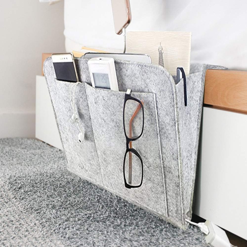 Squared Away Felt Bedside Pocket Caddy - 1 large pocket and 4 small pockets. - Simply side under your mattress or in between your mattress and frame and BOOM...everything within reach! You can also slide under a couch cushion - The soft felt texture means there's no chance at scratching screens on your phone / tablet. Caddies like this are $25 on amazon with 2,000+ 5-star reviews - see additional image, but just $9.99 from us! Order 4 or more and SHIPPING IS FREE!