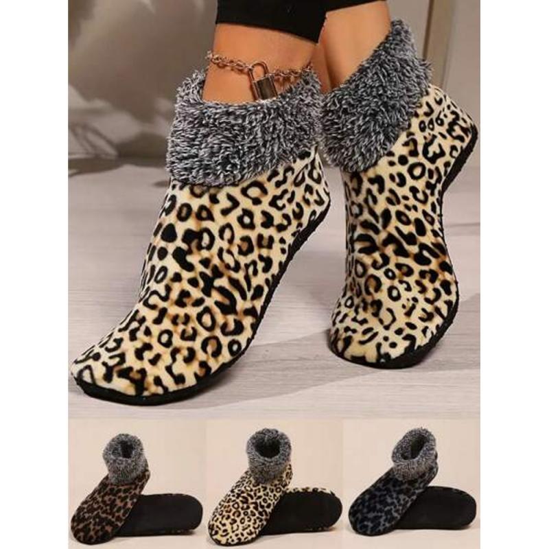 ALMOST GONE - CLEARANCE - THREE Pairs or Leopard Plush Non-Skid Grip Slipper Sock Booties. - Stay cozy these plush slipper sock booties! Designed for warmth and comfort, these ultra-soft plush socks that keeps your feet toasty during chilly days. The non-skid grips on the soles provide extra traction, making them perfect for hardwood floors and preventing slips.- Fits womens shoe sizes 8-11 - SHIPS FREE! 